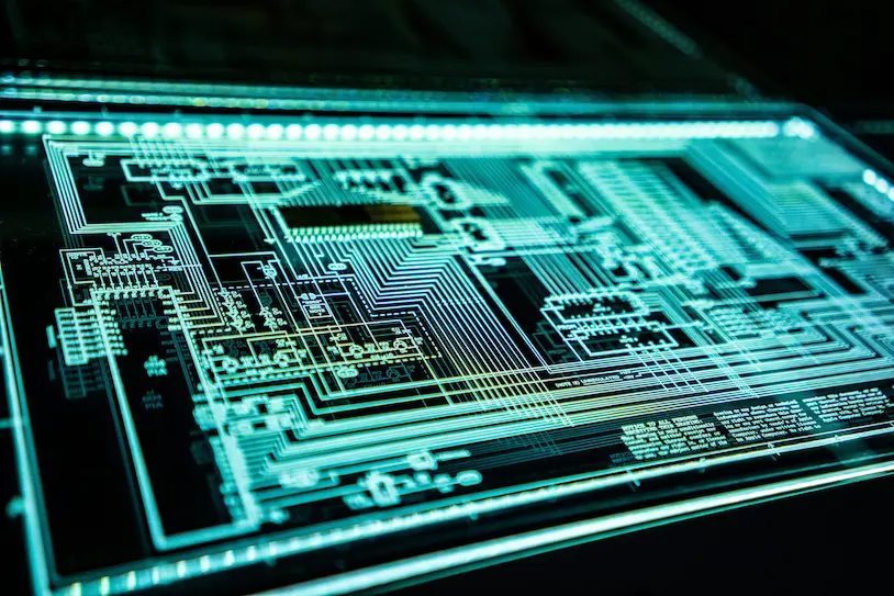 Glowing cyan circuit board chip architecture in transparent perspective view